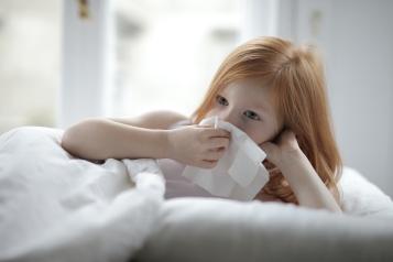A Sick Girl Wiping Her Nose with Tissue - Photo by Andrea Piacquadio: https://www.pexels.com/