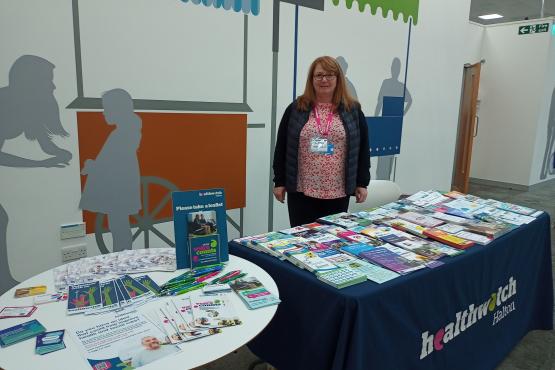 Healthwatch Halton Outreach stall, full of information leaflets.  